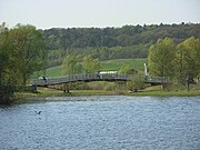 Mostek nad stawem parkowym