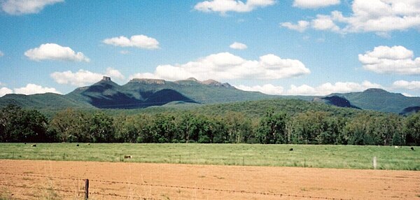 View of farmlands from the Newell Highway at the base of the Nandewar Range in the south east of the shire