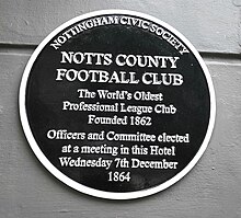 Plaque at the George Hotel Nottingham commemorating Notts County Football Club's first meeting to elect officers and committee on 7 December 1864 NottsCountyGeorgeHotel1862.jpg