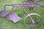 an old iron plow