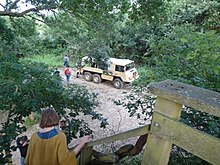 Visitors being given a tour of Knepp Wildland On safari at Knepp Wildland.jpg