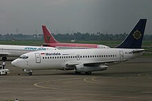 PK-RIM, the Boeing 737-230 Adv involved in the Mandala 91 crash, seen at Soekarno-Hatta International Airport, in 2004. PK-RIM Boeing 737 Mandala (8392085316).jpg