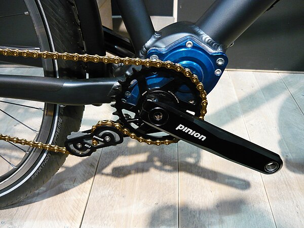 A bicycle gearbox with chain tensioner