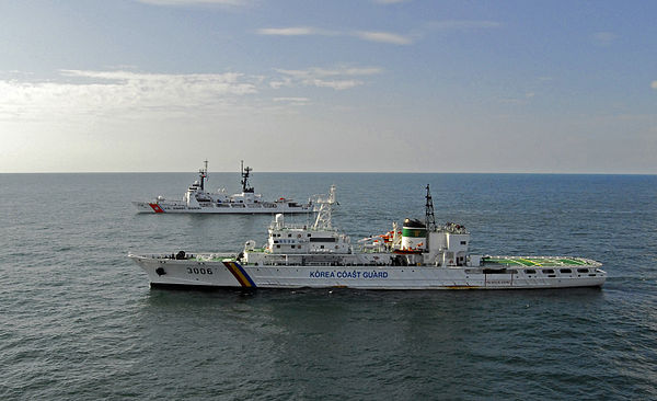 KCG vessel No. 3006 sailing alongside U.S. Coast Guard cutter USCGC Boutwell (WHEC-719) in August 2007