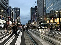 Downtown Hiroshima Rijo-dori Street from platform of Hondori Station at dusk.jpg