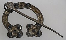 The Rogart Brooch, National Museums of Scotland, FC2. Pictish penannular brooch, 8th century. Silver with gilding and glass. Classified as Fowler H3 type. RogartDSCF6220.jpg