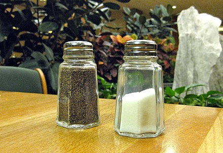A pair of pepper and salt shakers