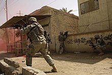 Soldiers from the 1st Cavalry Division engaging insurgents in the Battle of Baqubah, 14 March 2007. Stryker Battalion rolls into Baqubah DVIDS38283.jpg
