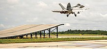 Super Hornet taking off from a ramp at NAS Pax River during demonstration. Super Hornet taking off from a ski jump ramp.jpg