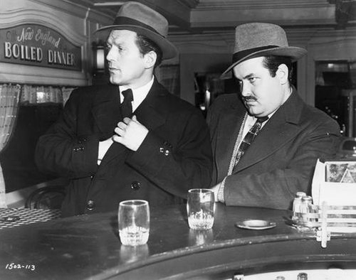 The killers (Charles McGraw, William Conrad) in The Killers, Conrad's film debut