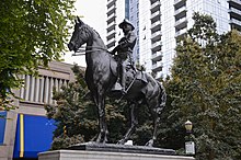 Theodore Roosevelt, Rough Rider (1922), Alexander Phimister Proctor Theodore Roosevelt statue on Park Blocks, Portland.jpg