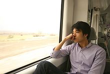 Man thinking on a train journey Thinking2.jpg