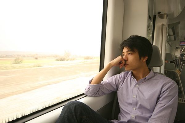 Man thinking on a train journey