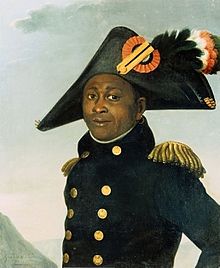 A painting of Louverture in a military uniform holding a document