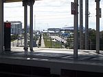 Миниатюра для Файл:Train Olympic village.JPG