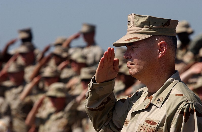 File:US Navy 060412-N-0411D-014 U.S. Navy Rear Adm. Richard W. Hunt salutes the Ensign during the playing of the National Anthem at the conclusion of the Combined Joint Task Force, Horn of Africa (CJTF HOA) change of command ceremon.jpg