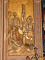 Relief dur retable: la crucifixion de Saint-Pierre.