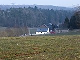 Lëtzebuergesch: Vue vum Kapellebierg zu Sandweiler op de Birelergronn.