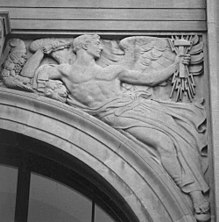 Spandrel figure above main entrance by Adolph A. Weinman Weinman in Davenport.jpg