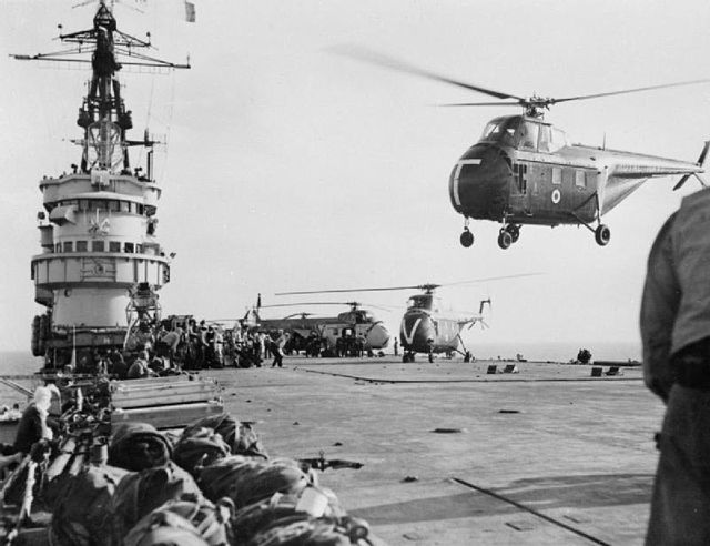 Royal Navy Westland Whirlwind helicopters taking the first men of 45 Royal Marine Commando into action at Port Said from HMS Theseus.