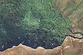 This highly detailed true-colour image shows the stark eastern edge of the Zambezi floodplain.