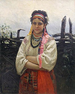 Portrait d'une femme de face plein de couleur.