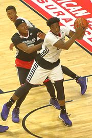 20150401 MCDAAG Caleb Swanigan rebounds in front of Diamond Stone (2).JPG