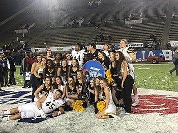 Appalachian State players, coaches, and cheerleaders celebrate their victory after the game. 2016 Camellia Bowl celebration.jpg