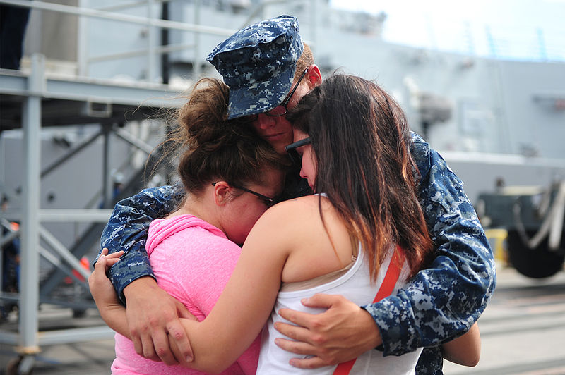 File:A U.S. Sailor assigned to the guided-missile destroyer USS Michael Murphy (DDG 112) embraces family and friends before leaving Joint Base Pearl Harbor-Hickam, Hawaii, for an independent deployment to the western 141020-N-QG393-018.jpg