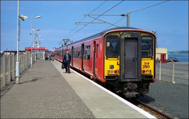 Class 318 in original orange and black Strathclyde Transport livery