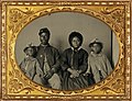 African American soldier in Union uniform with wife and two daughters (cropped).jpg