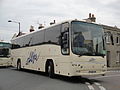 Alpha Travel PN08 KXM, a Volvo B12B/Plaxton Paragon, in Victoria Street, Ryde, Isle of Wight as part of a coach tour.