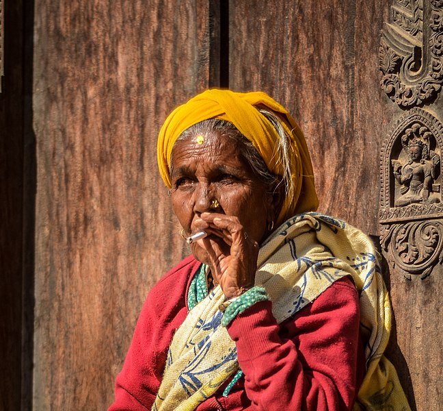 File:An old lady smokes in Bhaktapur Durbar Square.jpg