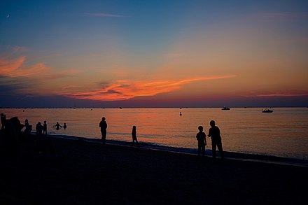 At sunset, by Joe Maddalone Cedar Beach.jpg