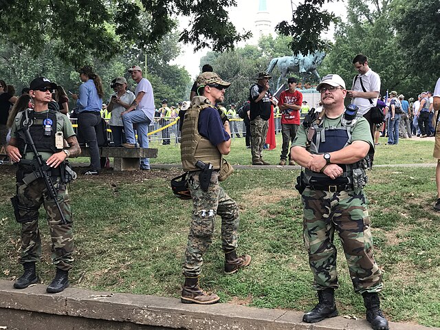 Far-right "Three Percenters" patrol Emancipation Park in Charlottesville, Virginia during the 2017 Unite the Right rally.