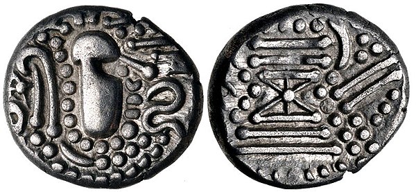 A Chaulukya-Paramara coin, c. 950-1050 CE. Stylized rendition of Chavda dynasty coins: Indo-Sassanian style bust right; pellets and ornaments around /