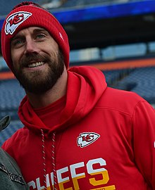 Smith in 2016 Col. Lorenzo Bradley takes a selfie with Alex Smith (3016277) (cropped).jpg