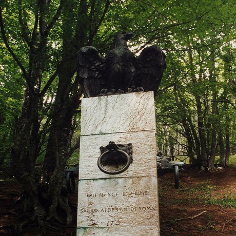 Source of the Tiber, marked by a column with an eagle and wolves, part of the Apennine fauna and symbols of Rome
