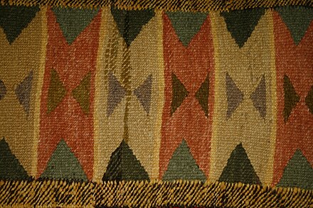 An example of a multicoloured blanket in the collection from the Simon Fraser University Museum of Archaeology and Ethnology