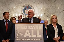 Sept. 13, 2017. Senator Bernie Sanders (I-VT) speaks in favor of Medicare for All. Senator Kirsten Gillibrand (D-NY) is standing to his left. DSC 8811 (36492684544).jpg