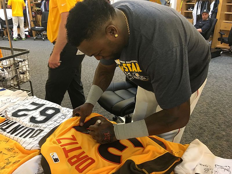 File:David Ortiz signs a jersey in the AL clubhouse before the -ASG (28444284015).jpg