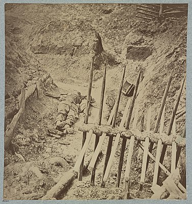 Dead Confederate soldier in trenches of Fort Mahone in front of Petersburg, Va., April 3, 1865 LCCN2012647837.jpg