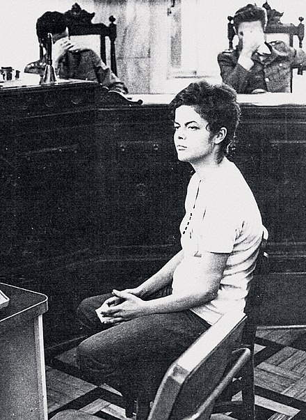 Rousseff on trial before the military dictatorship judges in 1970. Note they choose to hide their faces from the camera.
