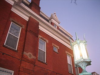 The dentils are visible in this image of the cornice that Isaac Ellwood added in 1899. EllwoodHouse5.jpg