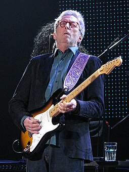 Eric Clapton was the third artist to have a lengthy run at number one in 1996, with the song "Change the World". Eric Clapton 01May2015.jpg
