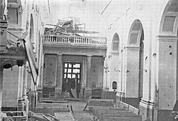Interior of the cathedral after the 1943 bombing, with the remains of the Sarracini-Inzoli organ on the chancel.