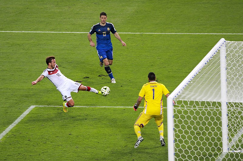 An Argentina players kicks The Adidas BRAZUCA FINAL RIO FIFA 2014