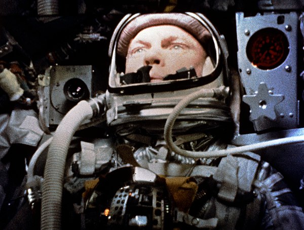 Still frame of John Glenn in orbit, taken by a motion picture camera inside Friendship 7