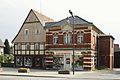 Residential house (surrounding area) with shop fitting and attached clinker brick building