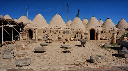 Artifacts of traditional life in the courtyard of a 'beehive house', Harran